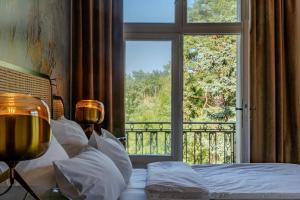 Postel nebo postele na pokoji v ubytování Villa Bleichröder