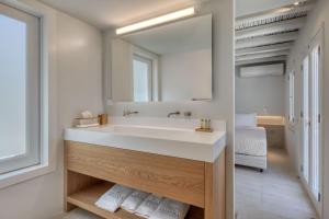 Um banheiro em Ammoa Beach Residences