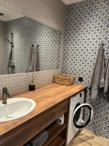 Koupelna v ubytování LUČI jūras apartamenti