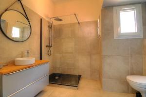 Ванная комната в Joli appartement en bord de mer