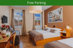 Posteľ alebo postele v izbe v ubytovaní Hotel Merkur - Czech Leading Hotels