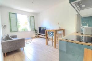 Кухня или мини-кухня в Joli appartement en bord de mer
