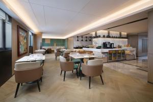 Posezení v ubytování Courtyard By Marriott Shanghai Xujiahui