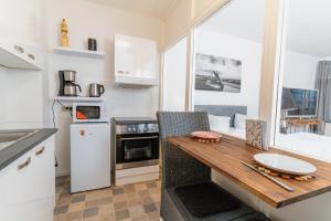 Η κουζίνα ή μικρή κουζίνα στο Koje Sansibar