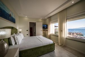 Postel nebo postele na pokoji v ubytování Epirus Hotel