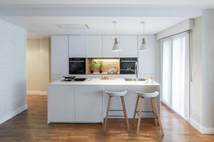 Kuchyň nebo kuchyňský kout v ubytování Home Luxury - Villagarcía