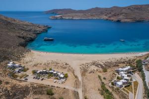 an aerial view of a beach with a boat in the water at Ammoa Beach Residences in Vayiá