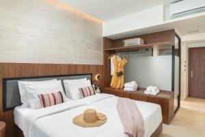 Postel nebo postele na pokoji v ubytování Elia Sea Suites
