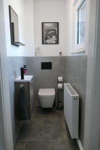 Ένα μπάνιο στο Großzügige Monteurwohnung