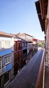 an empty street in a town with buildings at Rooms4you 1 in historic center of Braga in Braga