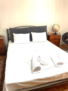 Ένα ή περισσότερα κρεβάτια σε δωμάτιο στο Heartbeat