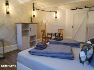 Llit o llits en una habitació de Keller-Loft Cottbus City