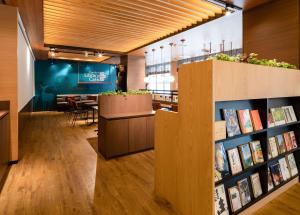 a book store with a dining room in the background at Comfort Hotel Nara in Nara