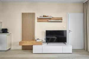 Et tv og/eller underholdning på Sea Sunrise Apartment Sozopol