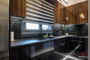 Kuchyň nebo kuchyňský kout v ubytování EDWARD Luxury Suite by homebrain
