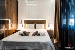 Postel nebo postele na pokoji v ubytování EDWARD Luxury Suite by homebrain