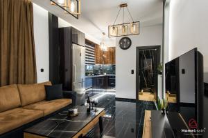 Posezení v ubytování EDWARD Luxury Suite by homebrain