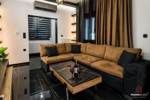Posezení v ubytování EDWARD Luxury Suite by homebrain