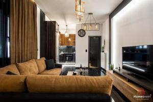 TV a/nebo společenská místnost v ubytování EDWARD Luxury Suite by homebrain