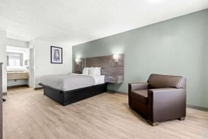 Postel nebo postele na pokoji v ubytování Quality Inn
