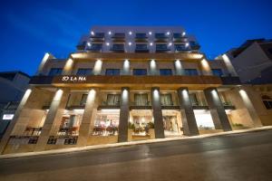 a building with lights on the front of it at Solana Hotel & Spa in Mellieħa
