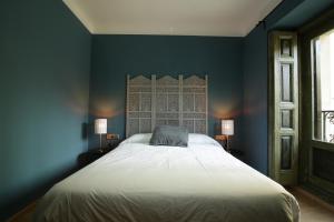 Cama o camas de una habitación en AbraCadabra Suites