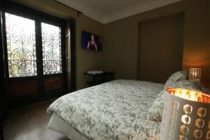 Cama o camas de una habitación en AbraCadabra Suites