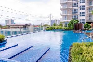 a swimming pool on the roof of a building at Jhezzstuffs staycation in Iloilo City