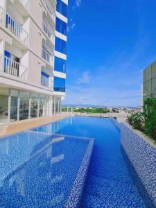 Bazén v ubytování Inspiria Condo Davao - Olivia's Haven 1801 nebo v jeho okolí