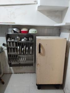 Η κουζίνα ή μικρή κουζίνα στο Shree Sona-Moti Homestay