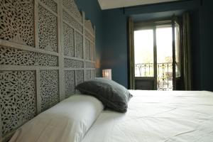 Cama o camas de una habitación en AbraCadabra Suites