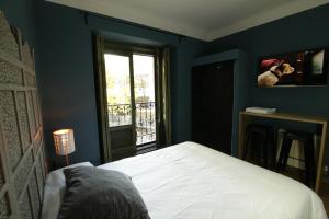 Cama o camas de una habitación en AbraCadabra Suites