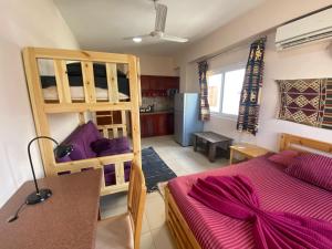 Ένα ή περισσότερα κρεβάτια σε δωμάτιο στο Dahab Relax Studio 4