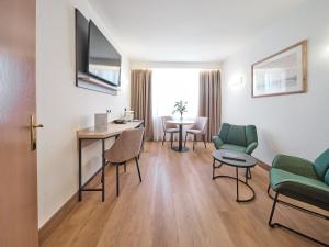 TV a/nebo společenská místnost v ubytování Hotel Albret
