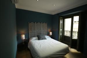 Cama o camas de una habitación en AbraCadabra Suites