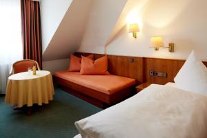 Postel nebo postele na pokoji v ubytování Hotel Zum Schiff