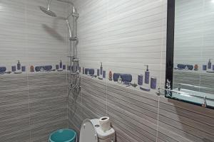Un baño de Appartement neuf 3 visé pour les familles