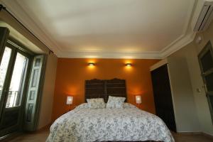 Cama o camas de una habitación en AbraCadabra Suites