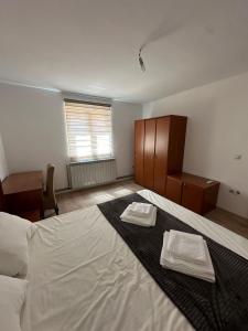 Postel nebo postele na pokoji v ubytování BIRDS apartmani