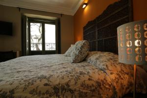 Cama o camas de una habitación en AbraCadabra Suites