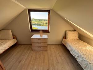 Postel nebo postele na pokoji v ubytování Domek u Ani