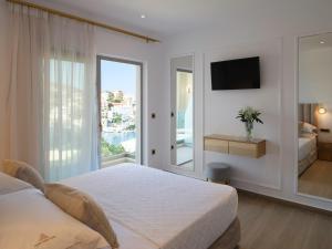 Кровать или кровати в номере Golden Luxury Suites