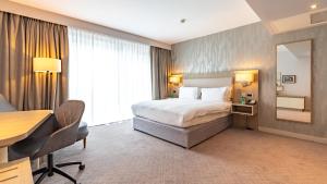 Ліжко або ліжка в номері Holiday Inn Manchester - City Centre by IHG