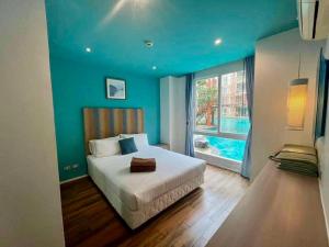 Postel nebo postele na pokoji v ubytování Atlantic Condo Resort Pattaya by Panisara + 37 fotografií