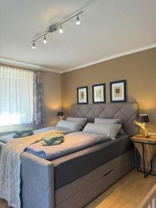 a bedroom with a large bed in a room at Ferienwohnung Die Möll in Latzendorf +68 photos
