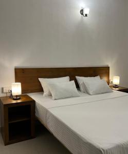 Ένα ή περισσότερα κρεβάτια σε δωμάτιο στο Pavlin Lodge