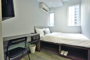 Letto o letti in una camera di Atlas Hostel & Backpackers