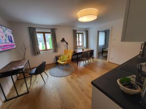 TV a/nebo společenská místnost v ubytování Quartier No. 7 - Serviced Living