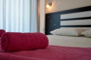 Cama ou camas em um quarto em Marku Palace