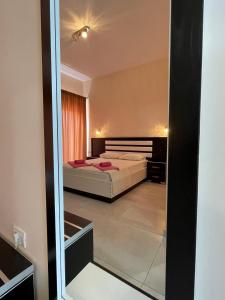Cama ou camas em um quarto em Marku Palace